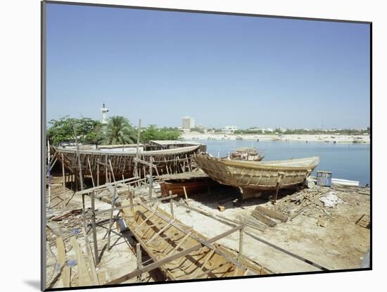 Dhows are still constructed using the traditional methods at Ajman wharf-Werner Forman-Mounted Giclee Print