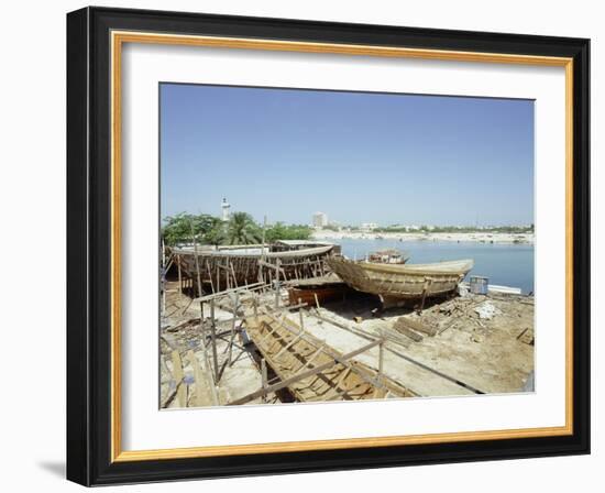 Dhows are still constructed using the traditional methods at Ajman wharf-Werner Forman-Framed Giclee Print