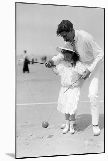 Diabolo, Learning with Papa, c.1900-Andrew Pitcairn-knowles-Mounted Giclee Print