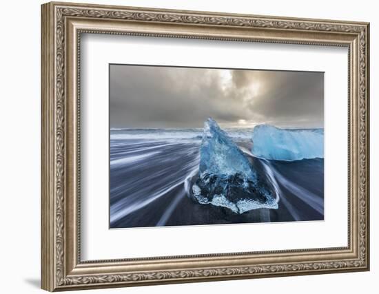 Diamond ice chards from calving icebergs on black sand beach, Jokulsarlon, south Iceland-Chuck Haney-Framed Photographic Print