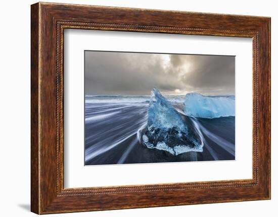 Diamond ice chards from calving icebergs on black sand beach, Jokulsarlon, south Iceland-Chuck Haney-Framed Photographic Print