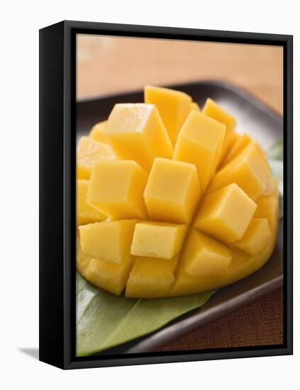 Diced Mango Still Attached to the Skin on Brown Plate-null-Framed Premier Image Canvas