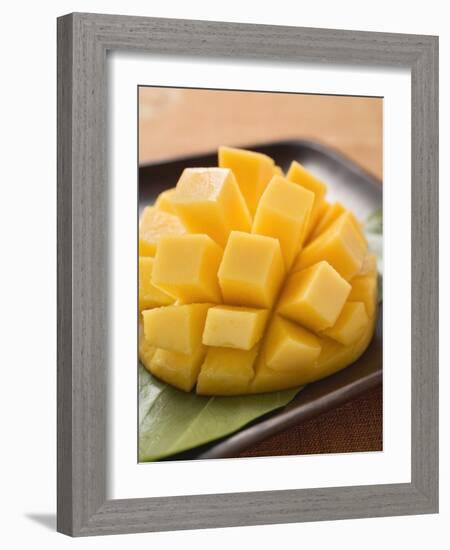 Diced Mango Still Attached to the Skin on Brown Plate-null-Framed Photographic Print