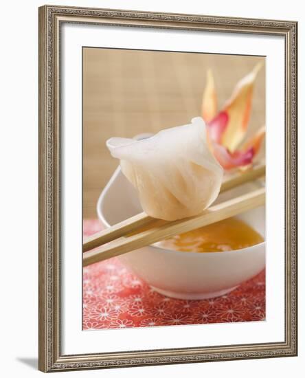 Dim Sum on Chopsticks over Dip (Asia)-null-Framed Photographic Print