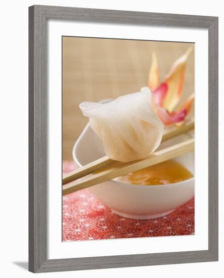 Dim Sum on Chopsticks over Dip (Asia)-null-Framed Photographic Print