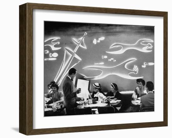 Dimly Lit Wall of the Sea Restaurant, with Customers Reading Their Menus with Flashlights-Wallace Kirkland-Framed Photographic Print