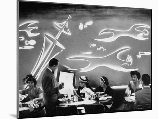 Dimly Lit Wall of the Sea Restaurant, with Customers Reading Their Menus with Flashlights-Wallace Kirkland-Mounted Photographic Print