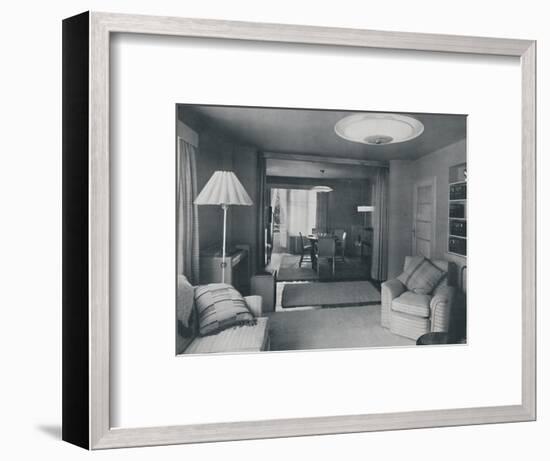 'Dining and living room, divided only by heavy curtains in an attractive modern weave', 1942-Unknown-Framed Photographic Print