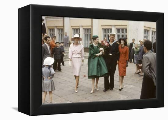 Dior Models Posing with Military Man in the Soviet Union, Moscow, Russia, 1959-Howard Sochurek-Framed Premier Image Canvas