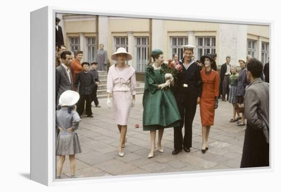 Dior Models Posing with Military Man in the Soviet Union, Moscow, Russia, 1959-Howard Sochurek-Framed Premier Image Canvas