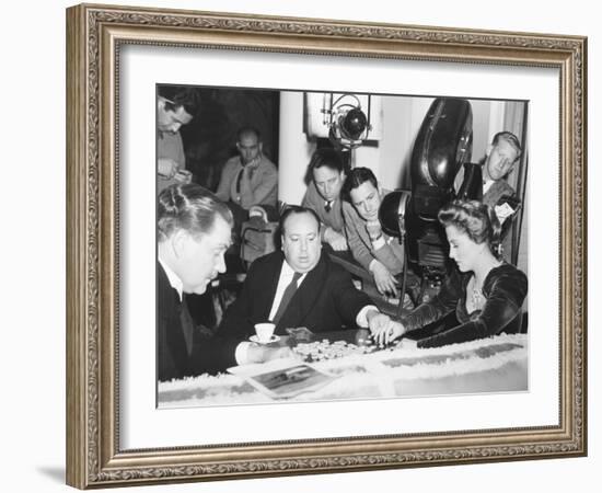 Director Hitchcock Directing a Scrabble Scene with Joan Fontaine in Suspicion-null-Framed Photo