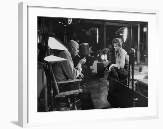 Director Howard Hawks Conferring with Actress Angie Dickinson on Set for "Rio Bravo"-Allan Grant-Framed Premium Photographic Print