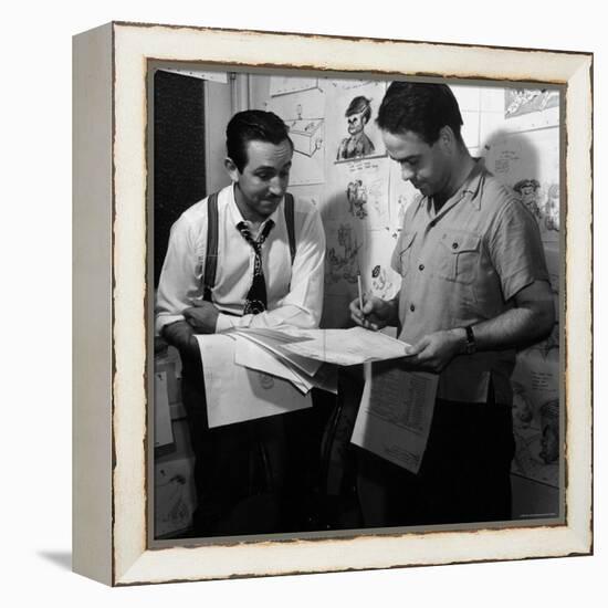 Director Walt Disney Looking over Sketches from His Latest Picture "Pinocchio."-Peter Stackpole-Framed Premier Image Canvas