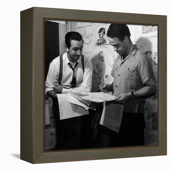 Director Walt Disney Looking over Sketches from His Latest Picture "Pinocchio."-Peter Stackpole-Framed Premier Image Canvas