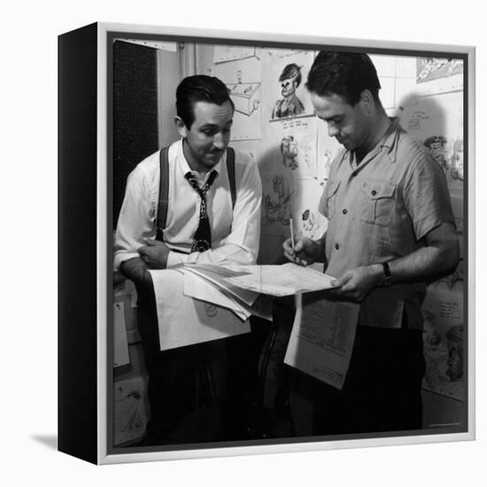 Director Walt Disney Looking over Sketches from His Latest Picture "Pinocchio."-Peter Stackpole-Framed Premier Image Canvas