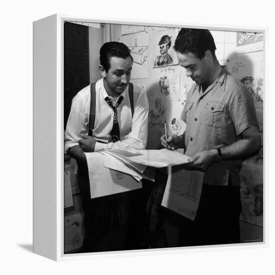 Director Walt Disney Looking over Sketches from His Latest Picture "Pinocchio."-Peter Stackpole-Framed Premier Image Canvas