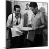 Director Walt Disney Looking over Sketches from His Latest Picture "Pinocchio."-Peter Stackpole-Mounted Premium Photographic Print