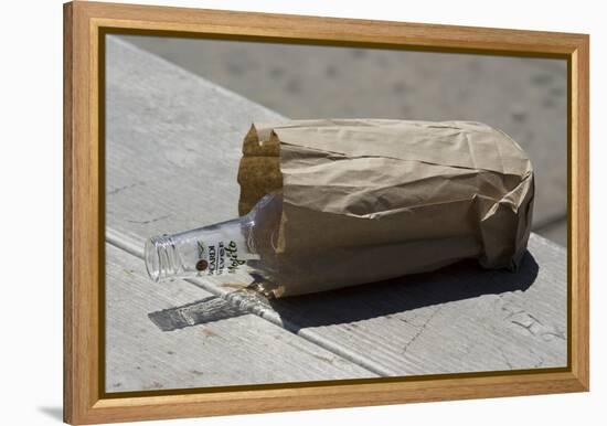 Discarded Rum Bottle In Paper Bag-Mark Williamson-Framed Premier Image Canvas