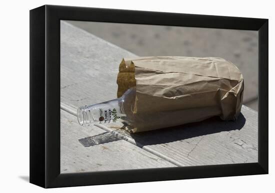 Discarded Rum Bottle In Paper Bag-Mark Williamson-Framed Premier Image Canvas