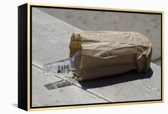 Discarded Rum Bottle In Paper Bag-Mark Williamson-Framed Premier Image Canvas