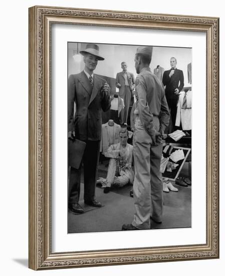 Discharged Gi Looking at New Suit Fashions-Nina Leen-Framed Photographic Print