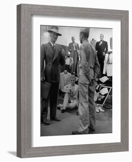 Discharged Gi Looking at New Suit Fashions-Nina Leen-Framed Photographic Print