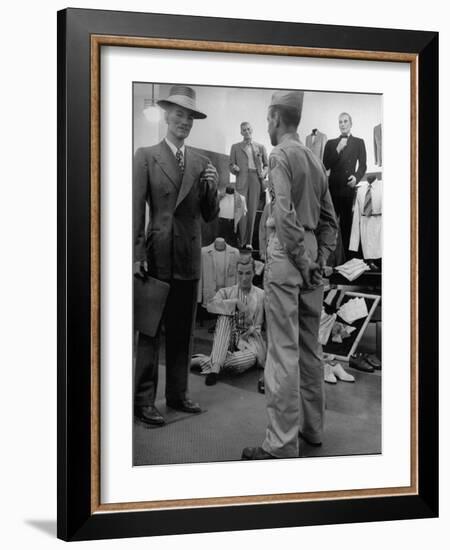 Discharged Gi Looking at New Suit Fashions-Nina Leen-Framed Photographic Print