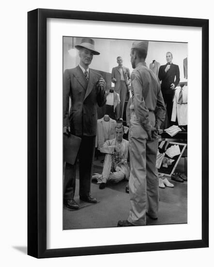 Discharged Gi Looking at New Suit Fashions-Nina Leen-Framed Photographic Print