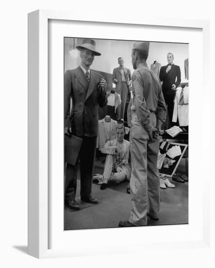 Discharged Gi Looking at New Suit Fashions-Nina Leen-Framed Photographic Print