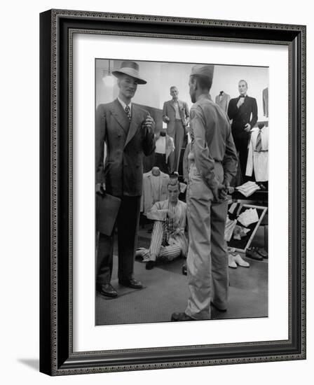 Discharged Gi Looking at New Suit Fashions-Nina Leen-Framed Photographic Print