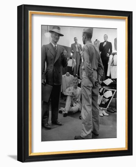 Discharged Gi Looking at New Suit Fashions-Nina Leen-Framed Photographic Print