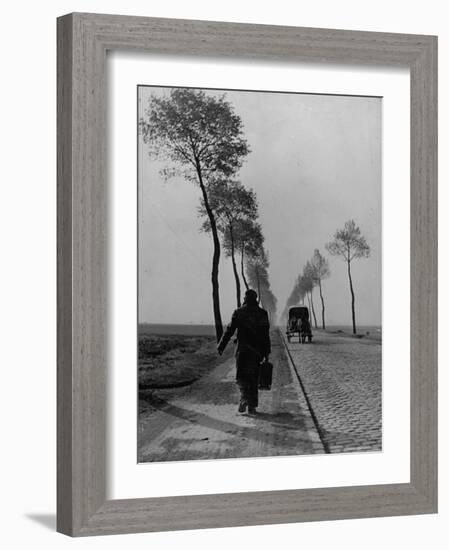 Displaced Person Returning Home from German Prison Camp, Walking Down Country Road-Ralph Morse-Framed Photographic Print