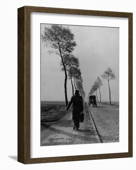 Displaced Person Returning Home from German Prison Camp, Walking Down Country Road-Ralph Morse-Framed Photographic Print