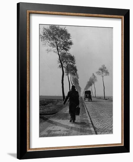 Displaced Person Returning Home from German Prison Camp, Walking Down Country Road-Ralph Morse-Framed Photographic Print