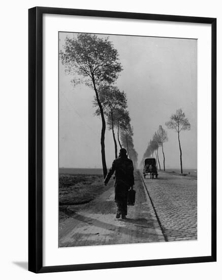 Displaced Person Returning Home from German Prison Camp, Walking Down Country Road-Ralph Morse-Framed Photographic Print