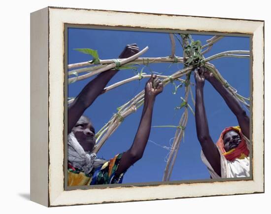 Displaced Sudanese Women Try to Rebuild their Tents in Refugee Camp in the Darfur Area of Sudan-null-Framed Premier Image Canvas