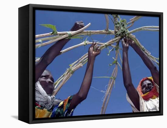 Displaced Sudanese Women Try to Rebuild their Tents in Refugee Camp in the Darfur Area of Sudan-null-Framed Premier Image Canvas