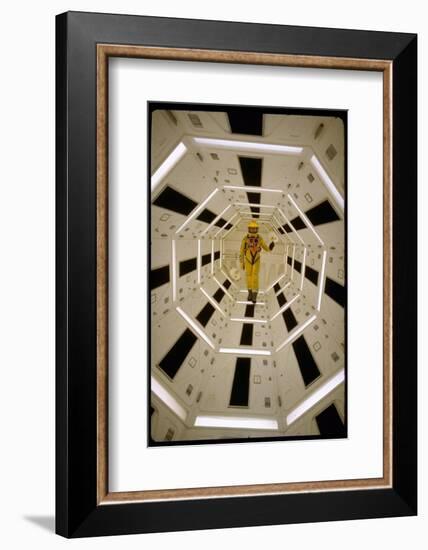 Distance Shot of Actor in Astronaut Suit Walking Through Geometrically Designed Hal Computer Center-Dmitri Kessel-Framed Photographic Print