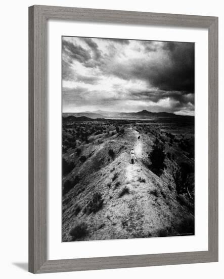 Distant of Artist Georgia O'Keeffe Taking Her Evening Walk at Ghost Ranch-John Loengard-Framed Premium Photographic Print