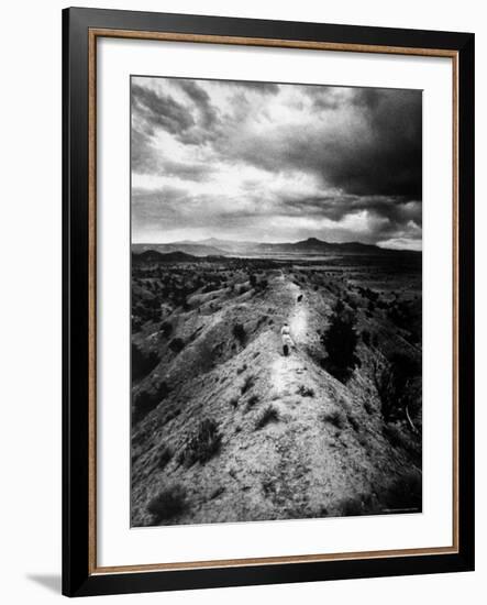 Distant of Artist Georgia O'Keeffe Taking Her Evening Walk at Ghost Ranch-John Loengard-Framed Premium Photographic Print