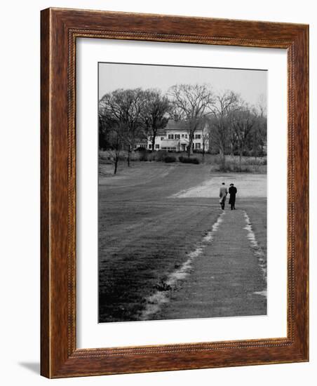 Distant of Mathematicians Albert Einstein and Kurt Godel Taking a Walk-Leonard Mccombe-Framed Premium Photographic Print