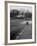 Distant of Mathematicians Albert Einstein and Kurt Godel Taking a Walk-Leonard Mccombe-Framed Premium Photographic Print