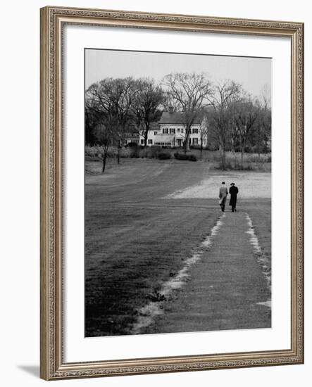 Distant of Mathematicians Albert Einstein and Kurt Godel Taking a Walk-Leonard Mccombe-Framed Premium Photographic Print