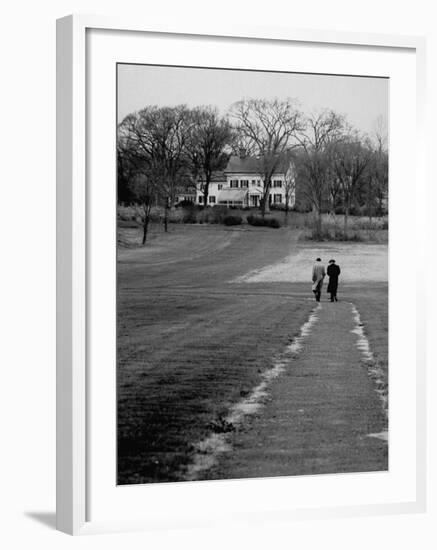 Distant of Mathematicians Albert Einstein and Kurt Godel Taking a Walk-Leonard Mccombe-Framed Premium Photographic Print