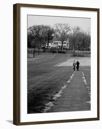 Distant of Mathematicians Albert Einstein and Kurt Godel Taking a Walk-Leonard Mccombe-Framed Premium Photographic Print