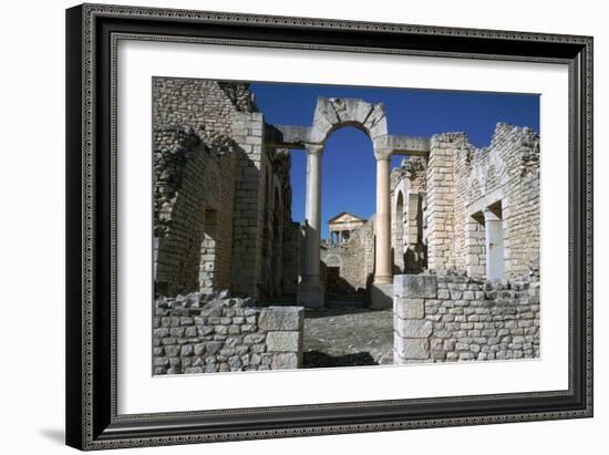 Distant Roman Capitol of Dougga Seen Through an Arch, 2nd Century-CM Dixon-Framed Photographic Print