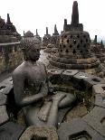 A Statue of Buddha Sits on a Terrace-Dita Alangkara-Premier Image Canvas