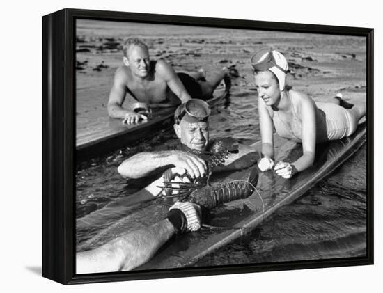 Diver Bringing Up Lobster for Beach Party-Peter Stackpole-Framed Premier Image Canvas