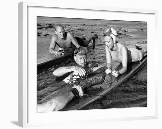 Diver Bringing Up Lobster for Beach Party-Peter Stackpole-Framed Premium Photographic Print