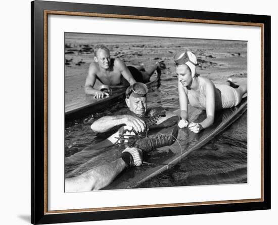 Diver Bringing Up Lobster for Beach Party-Peter Stackpole-Framed Premium Photographic Print